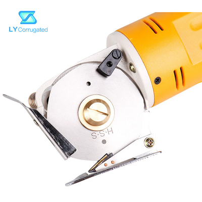 Tesouras elétricas amarelas da tela 170W em volta das peças de maquinaria portáteis de matéria têxtil da lâmina de corte