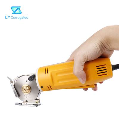 Tesouras elétricas amarelas da tela 170W em volta das peças de maquinaria portáteis de matéria têxtil da lâmina de corte